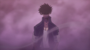 Dabi emerges from the smoke created from High-End's burnt corpse.