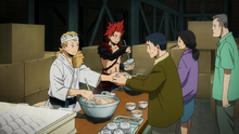 Eijiro and Mashirao distributing food