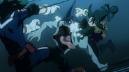 Tsuyu saves Izuku from a shark-like villain.