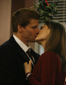 Booth-and-brennan-kiss-under-the-mistletoe-in-season-3s-the-santa-in-the-slush