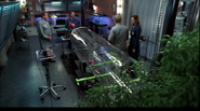 Max, Hodgins, and Wendell test a wind tunnel.