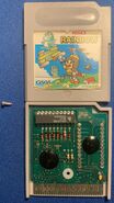 Picture of a disassembled 1993 copy of the Gowin Prince Rainbow release, which features the cartridge PCB.