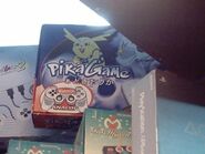 A PikaGame box sporting new artwork and featuring a analog controller. "PikaGame2" can be seen in the back.