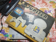 Another famiclone called "Jupiter". Notably, it advertises a PikaGame cartridge.