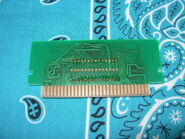 The back of the orange-boxed reprint's PCB.