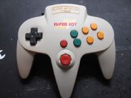 A white Super Joy controller.