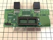 Riverse Kids SEM Board.jpg (441 KB) Custom-manufactured "SEM Board" from a top-loading cartridge of Riverse Kids, with an empty DIP socket for the cartridge ROM.