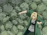 Tsunade using her chakra enhanced strength.