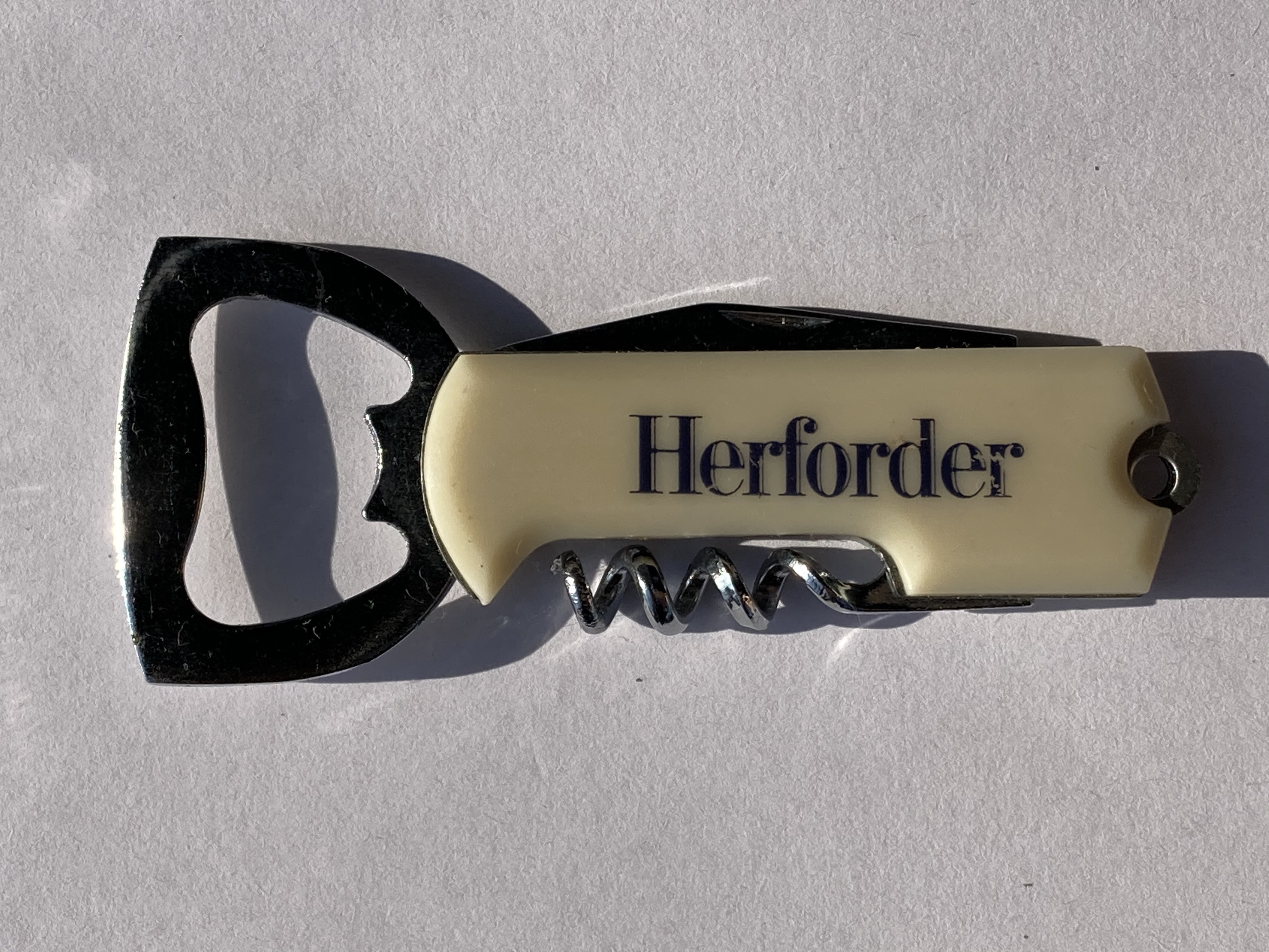 Herforder small multifunctional bottle opener with white rubber