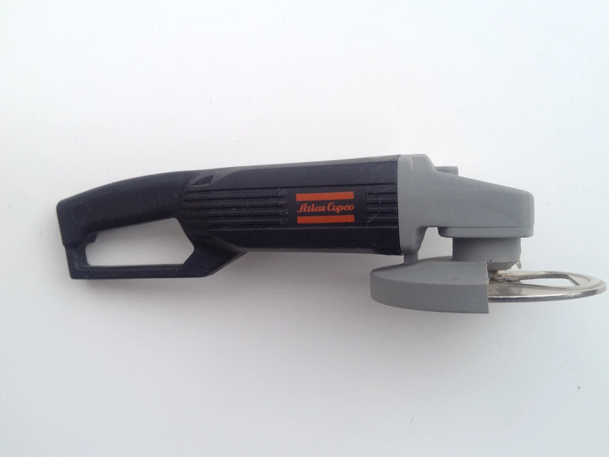 Atlas Copco disc grinder shaped plastic bottle opener Bottle Openers