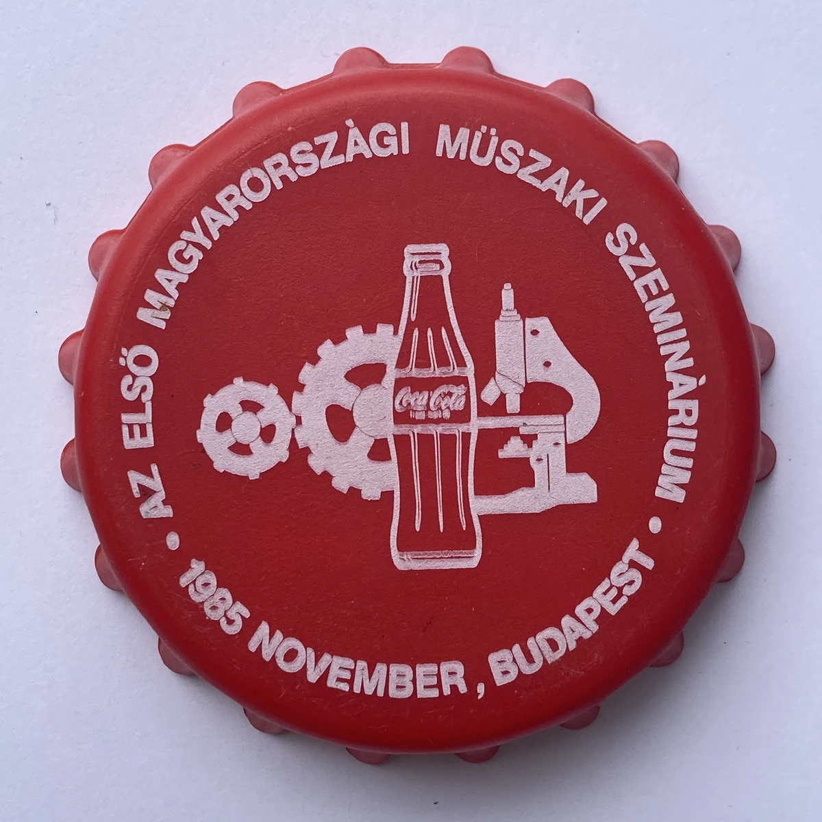 Az Első Magyarországi Műszaki Szeminárium red plastic bottle cap shaped
