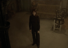 Petra left alone in the  safe house