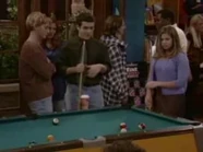 Topanga and Stuart play pool in the student union