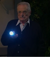 Mr. Fenny holding a flashlight in 2015