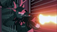 Yamada firing a rifle
