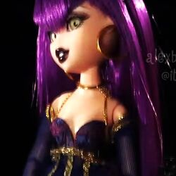 Purple haired bratz doll top