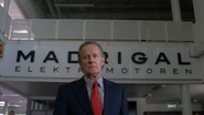 Schuler standing in front of the "Madrigal Elektromotoren" sign. ("Madrigal")