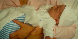 Newborn William dressed for visitors