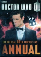 With the TARDIS, celebrating the show's 50th anniversary