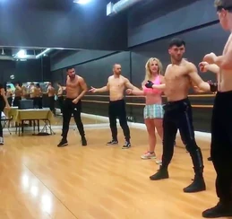 Britney teaching her dancers in rehearsals for Domination
