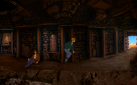 George running for his life before the cave's door closes