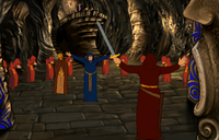 The Gatekeeper holding a representation of Baphomet's power