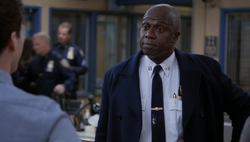 Holt does not wipe away the stain on his tie