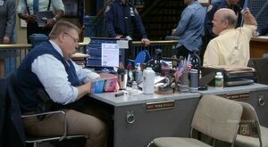 S2 E22 Hitchcock using his back scratcher
