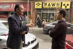 Mr. Santiago and Jake discuss an old, unsolved case.