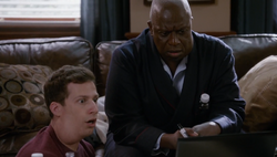 Holt and Jake work on the case while delirious