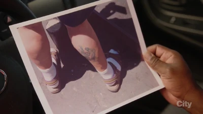 Phot of Jordan Carfton's tattoo from video surveillance at Fun Zone