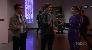 Synchron S3 E3 1.jpg (433 KB) Donald and Sherwin talking to Dvora about her latex suit