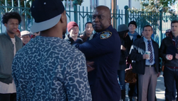 Holt challenges the street performer to a dance off