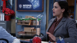 Amy looks in horror as the precinct is evacuated