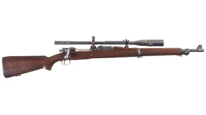 The M1903/A4 Springfield. It is mounted with its distinctive and elongated "Unertl" Scope.