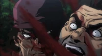Masashi slits Isamu's throat