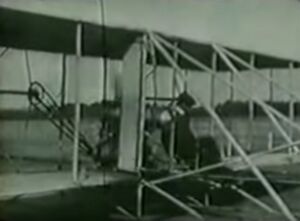 The Wright Brothers fly the first powered biplane