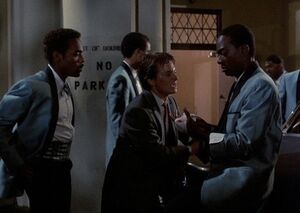 Marty, Marvin and the Starlighters backstage. Marvin has a bandaged left hand after injuring himself with a screwdriver when freeing Marty from the trunk of the band's car.