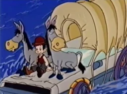 The mules and Jules Brown sit on the DeLorean.