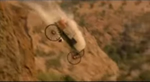 Clara's wagon buckboard plunges to its destruction in the ravine.