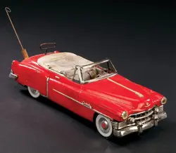 El Cadillac de juguete usado en el modelo. Nótese el interior chamuscado.