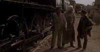 Marty and Doc talking to train engineer