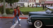 While exploring 1955, Marty is almost hit by a car, foreshadowing him being hit by his grandfather's car.