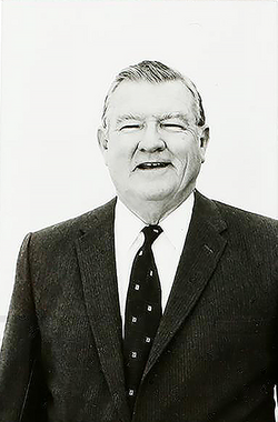 Hal Gausman as Mayor Red Thomas