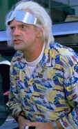 Doc's Hawaiian shirt with a cartoon pattern of trains and cowboys foreshadows the train hijacking in Part III.