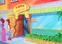 Clara and Marty walking past Luau Lunch Hut.