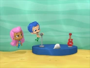 Gil pretending to be in a band