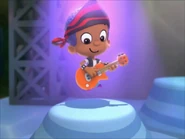 Goby playing on the guitar