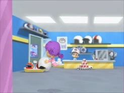 Oona going to Gil's Helmet Shop