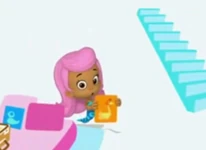 Molly showing Mother Goose to the viewer.